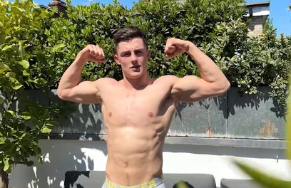 Ripped & Muscular Stud Tristan Flexing outdoors